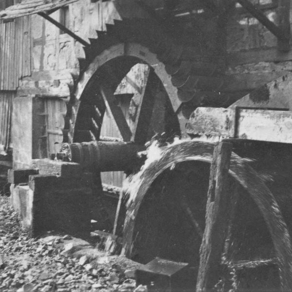 Historical photograph of the mill wheels